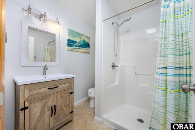 761 Bayberry Ct Lot 119, Corolla, NC 27927 - bathroom with a shower with shower curtain, vanity, toilet, and baseboards