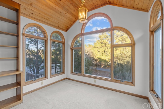 interior space with wood ceiling, vaulted ceiling, and an inviting chandelier