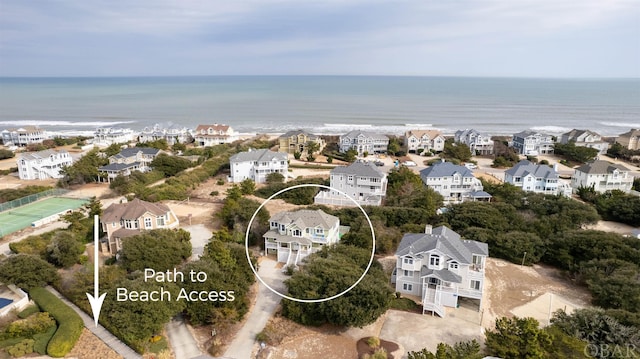 aerial view with a water view and a residential view