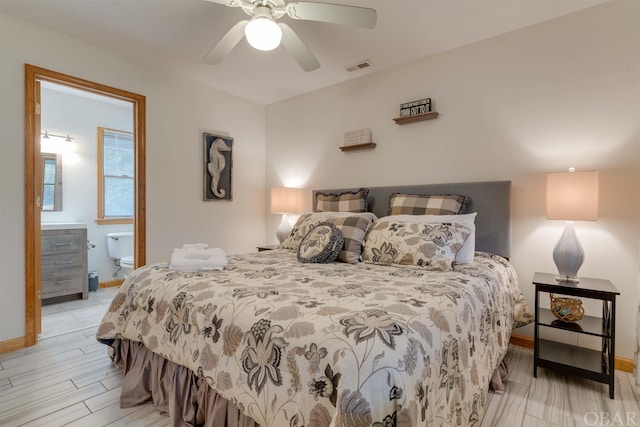 bedroom with a ceiling fan, light wood-type flooring, visible vents, and baseboards