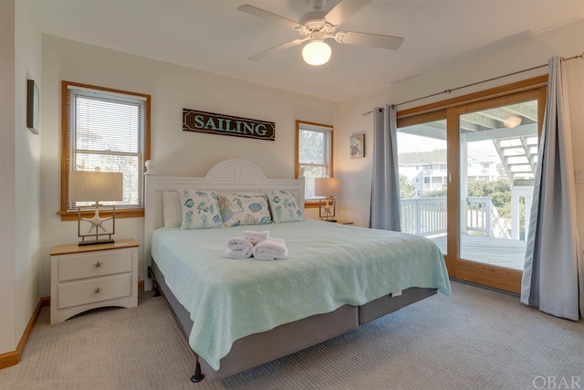 bedroom with light carpet, access to outside, a ceiling fan, and baseboards