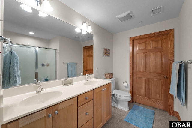 bathroom featuring a shower stall, visible vents, a sink, and tile patterned floors