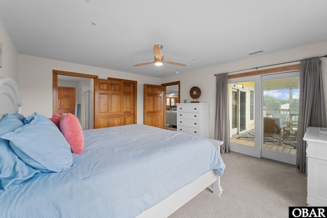 bedroom with ceiling fan, access to outside, visible vents, and light colored carpet