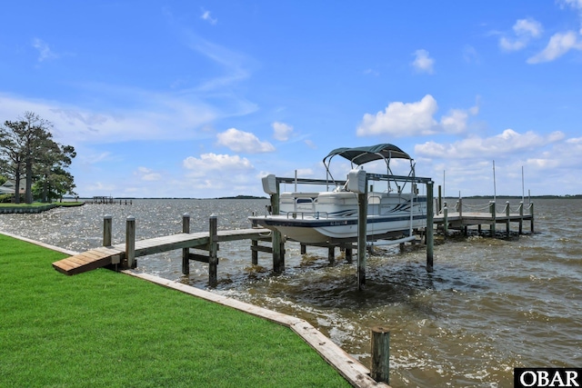 dock area featuring a water view and boat lift