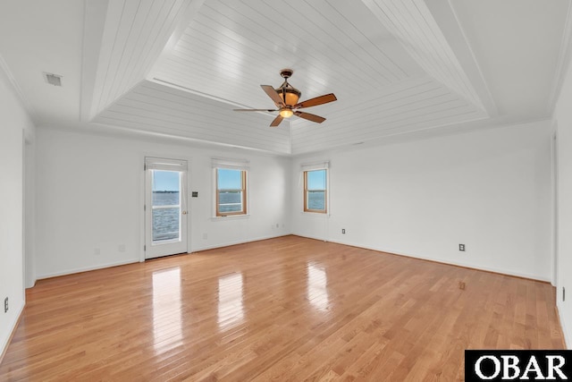 empty room featuring light wood finished floors, ceiling fan, and wooden ceiling