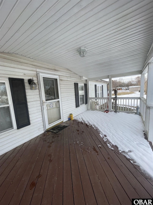 view of snow covered deck