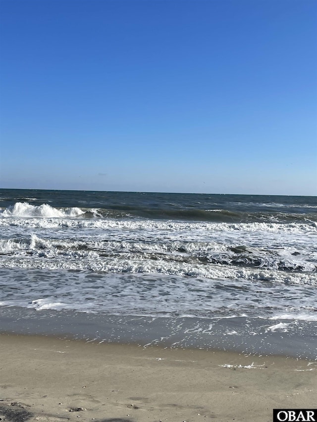 water view featuring a beach view