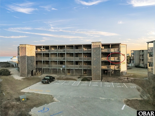 view of building exterior with a water view