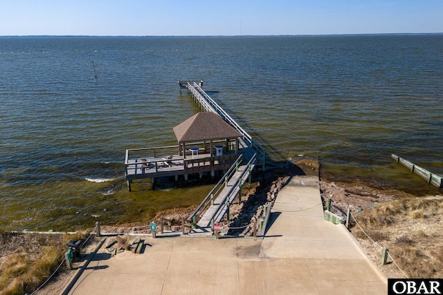 dock area with a water view