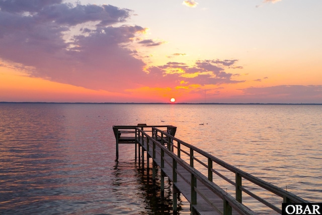 dock area featuring a water view