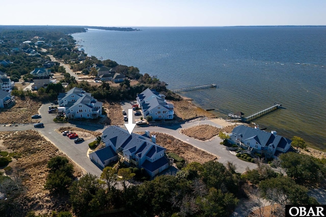 bird's eye view featuring a residential view and a water view