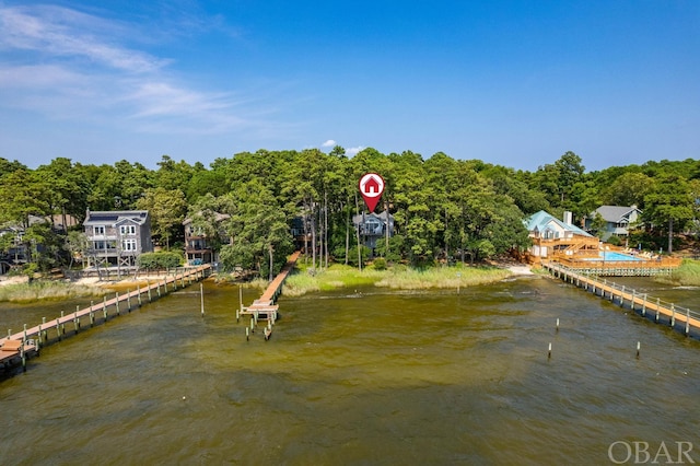 view of water feature with a view of trees