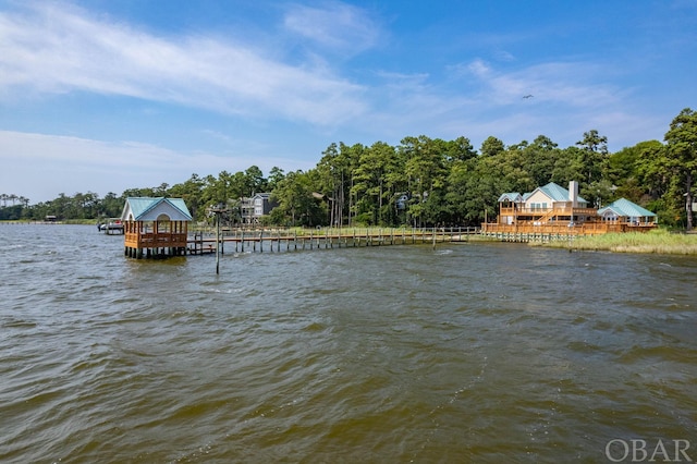 view of dock with a water view