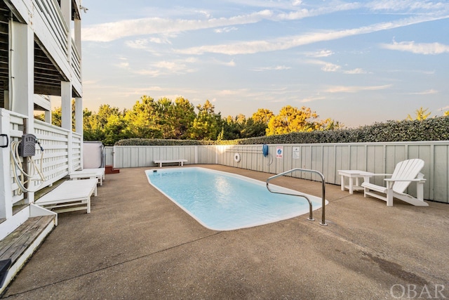 view of pool with a fenced backyard, a fenced in pool, and a patio