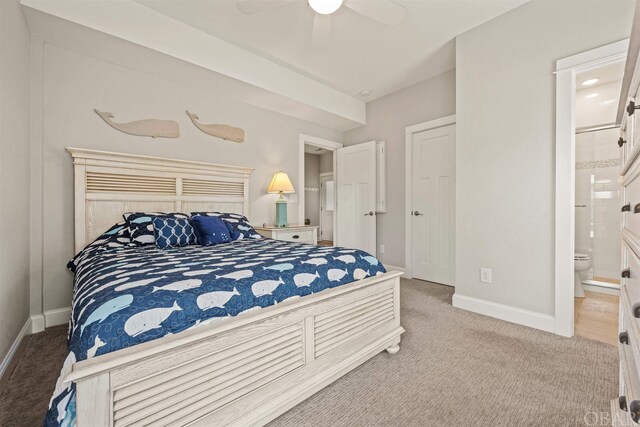 carpeted bedroom featuring ceiling fan, baseboards, and ensuite bathroom