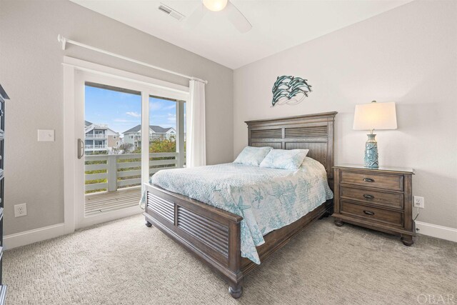 bedroom featuring light carpet, access to exterior, baseboards, and visible vents