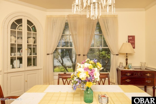 505 N Broad St, Edenton, NC 27932 - dining space with crown molding and a notable chandelier