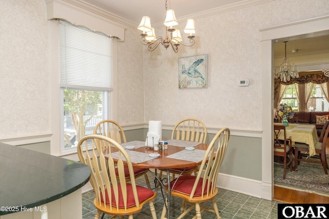 505 N Broad St, Edenton, NC 27932 - dining room featuring baseboards, a notable chandelier, and crown molding