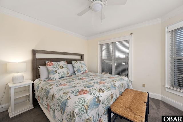 bedroom with baseboards, ceiling fan, carpet flooring, and crown molding