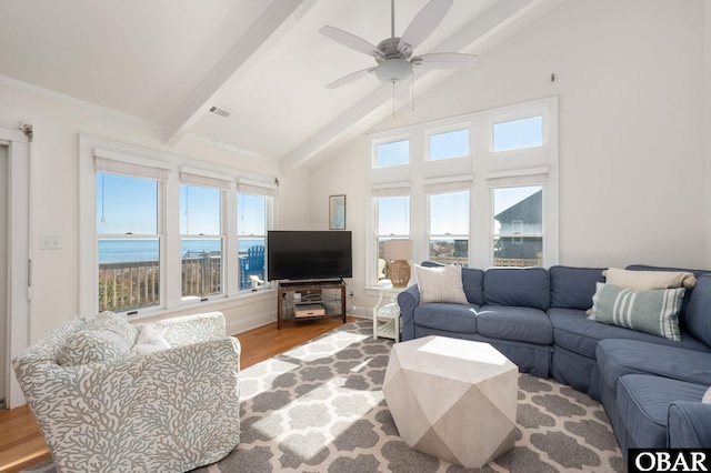 living room featuring wood finished floors, visible vents, high vaulted ceiling, ceiling fan, and beamed ceiling