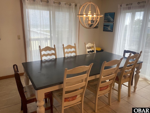 58221 Liberator Way Lot 1-3, Hatteras, NC 27943 - dining area with a chandelier and light tile patterned floors