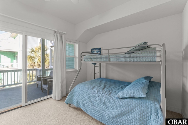 bedroom featuring access to exterior and carpet floors