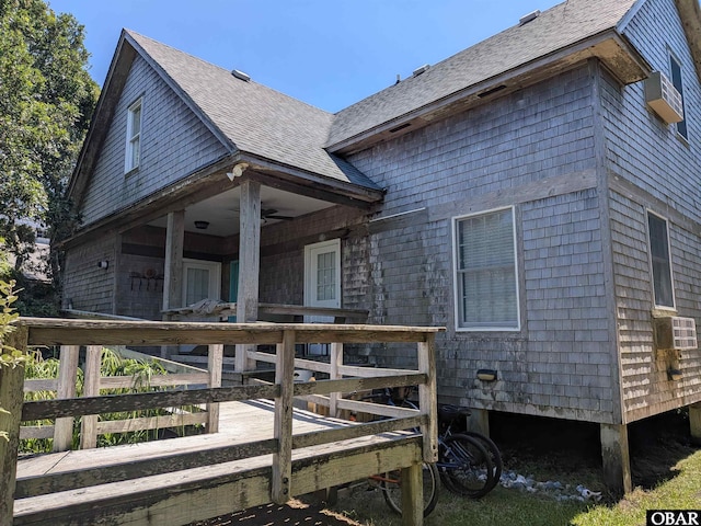 671 Irvin Garrish Hwy Lot # 1, Ocracoke, NC 27960 - view of side of home featuring roof with shingles and ceiling fan