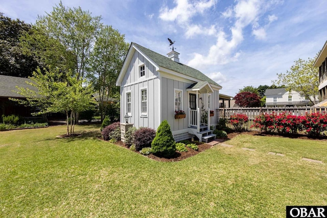 504 Lord Essex Ave, Manteo, NC 27954 - view of outbuilding featuring fence and entry steps