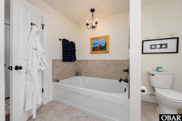 504 Lord Essex Ave, Manteo, NC 27954 - full bath with baseboards, marble finish floor, a chandelier, and toilet