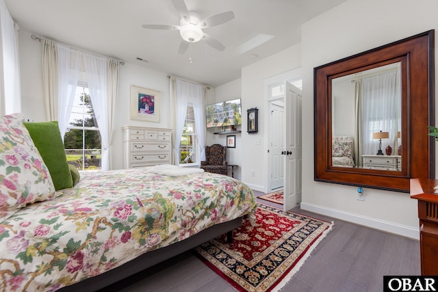 504 Lord Essex Ave, Manteo, NC 27954 - bedroom featuring ceiling fan, baseboards, visible vents, and wood finished floors