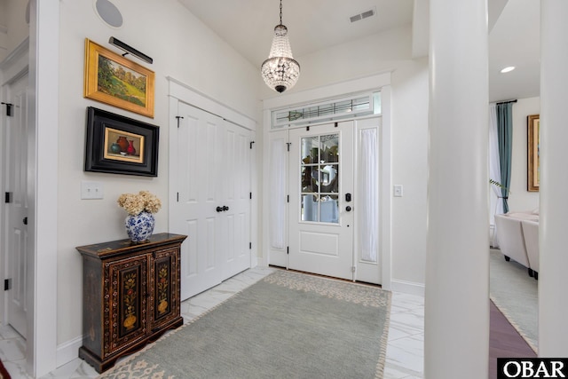 504 Lord Essex Ave, Manteo, NC 27954 - foyer featuring visible vents, marble finish floor, and baseboards