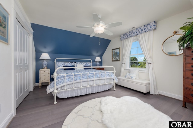 504 Lord Essex Ave, Manteo, NC 27954 - bedroom featuring baseboards, a closet, wood finished floors, and visible vents