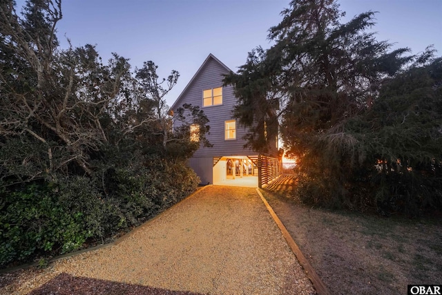 exterior space with dirt driveway