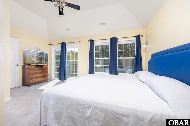 bedroom featuring visible vents, carpet floors, baseboards, ceiling fan, and vaulted ceiling