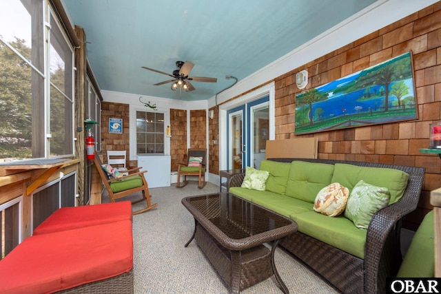 sunroom / solarium with ceiling fan