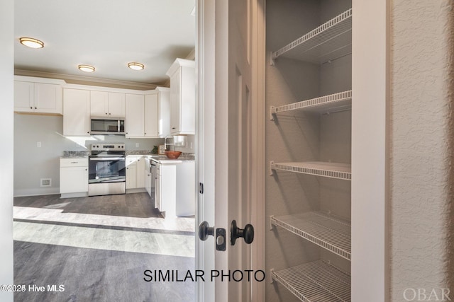 pantry with a sink