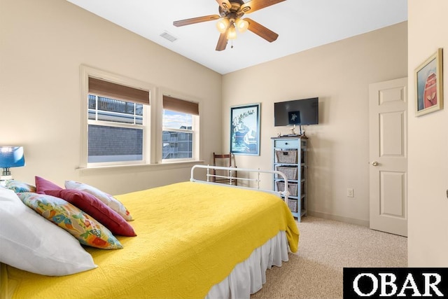 bedroom with baseboards, visible vents, ceiling fan, and light colored carpet