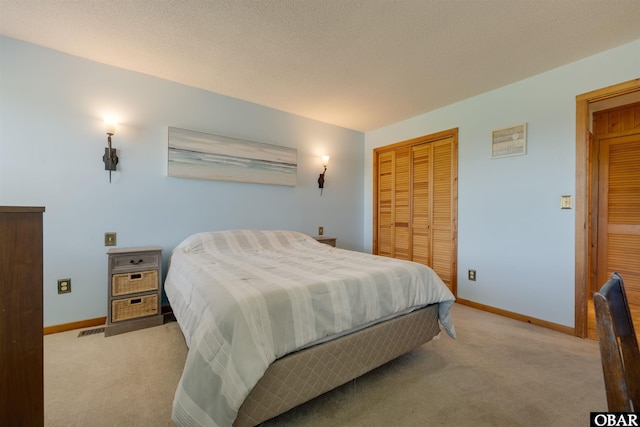 2009 Wrightsville Blvd Unit 4-B, Kill Devil Hills, NC 27948 - carpeted bedroom featuring baseboards and a closet