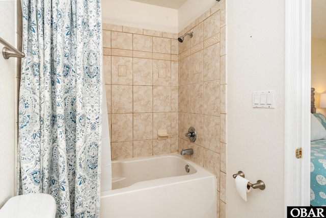 bathroom featuring shower / bath combination with curtain