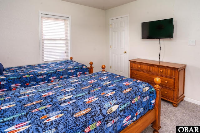 bedroom with light carpet