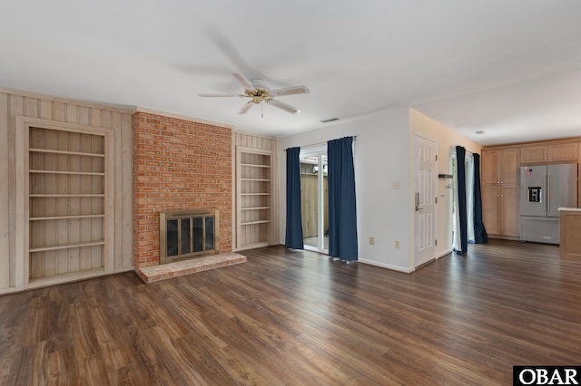 3002 Seahorse Ct Unit 3002, Kitty Hawk, NC 27949 - unfurnished living room with built in features, ceiling fan, baseboards, and dark wood finished floors