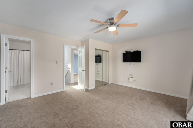 3002 Seahorse Ct Unit 3002, Kitty Hawk, NC 27949 - unfurnished bedroom featuring carpet flooring, baseboards, ceiling fan, and a closet