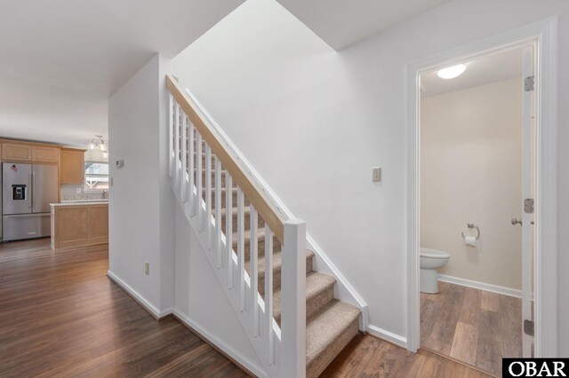 3002 Seahorse Ct Unit 3002, Kitty Hawk, NC 27949 - staircase with wood finished floors and baseboards
