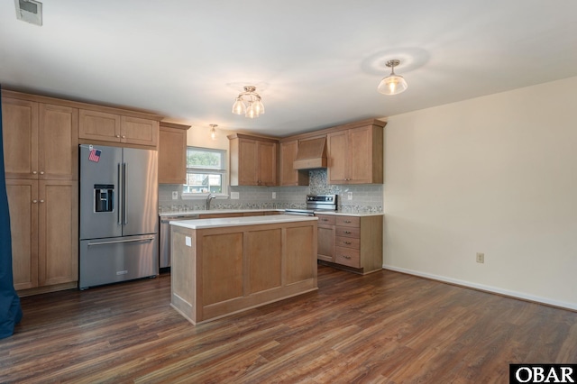 3002 Seahorse Ct Unit 3002, Kitty Hawk, NC 27949 - kitchen featuring stainless steel appliances, premium range hood, dark wood-type flooring, backsplash, and light countertops