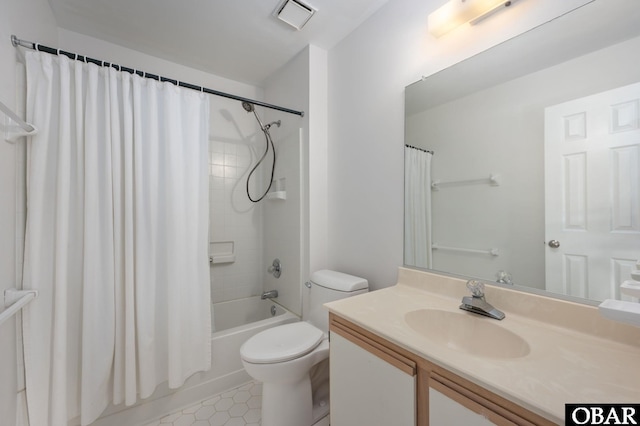 3002 Seahorse Ct Unit 3002, Kitty Hawk, NC 27949 - bathroom featuring toilet, shower / bath combo with shower curtain, vanity, and tile patterned floors