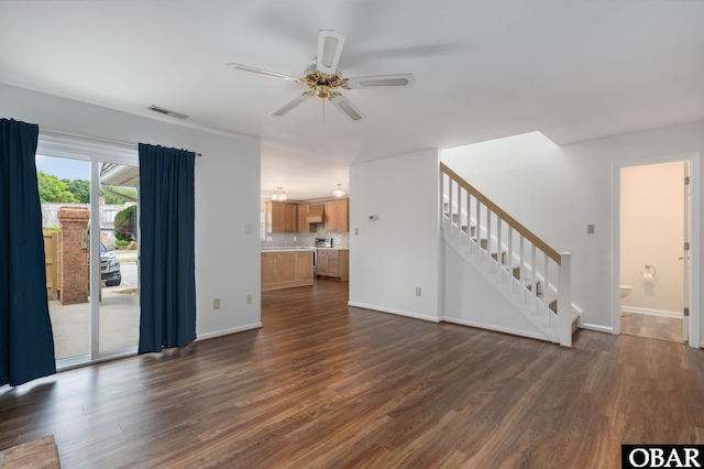 3002 Seahorse Ct Unit 3002, Kitty Hawk, NC 27949 - unfurnished living room featuring stairway, dark wood-type flooring, and a ceiling fan
