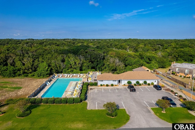 3002 Seahorse Ct Unit 3002, Kitty Hawk, NC 27949 - drone / aerial view of a heavily wooded area and a pool area