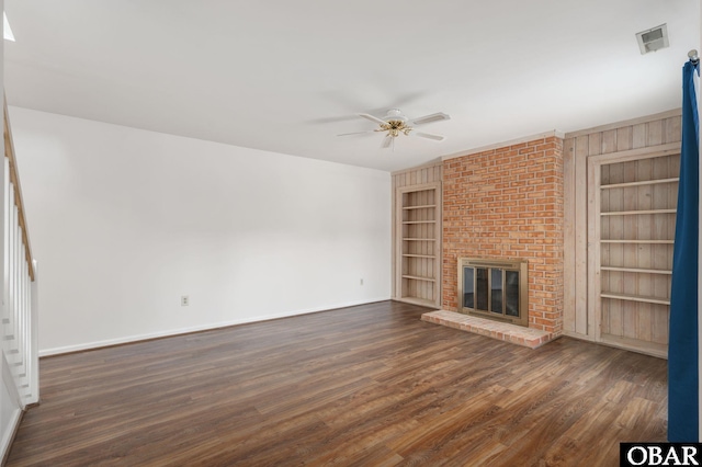 3002 Seahorse Ct Unit 3002, Kitty Hawk, NC 27949 - unfurnished living room featuring built in shelves, a ceiling fan, dark wood-style floors, and baseboards