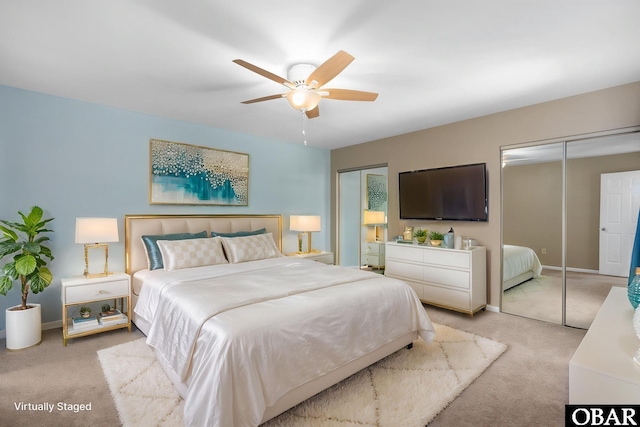 3002 Seahorse Ct Unit 3002, Kitty Hawk, NC 27949 - bedroom featuring light carpet, baseboards, and a ceiling fan