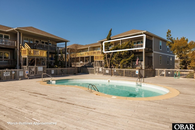 community pool with fence